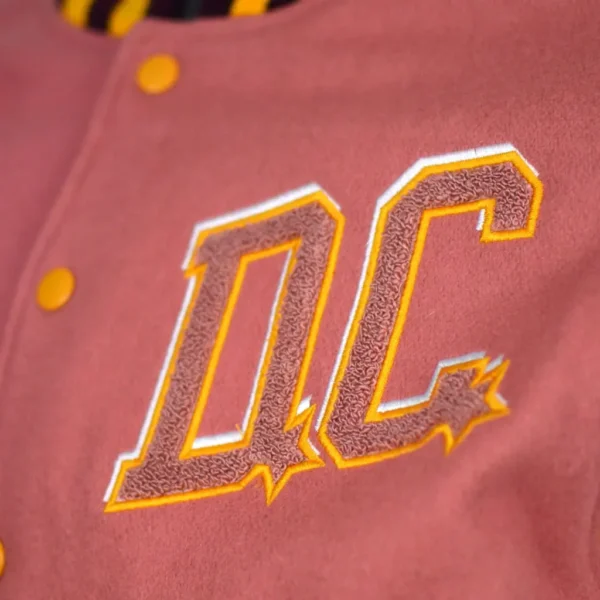 DC Proper Pink Washington Commanders Women’s Cropped Varsity Jacket