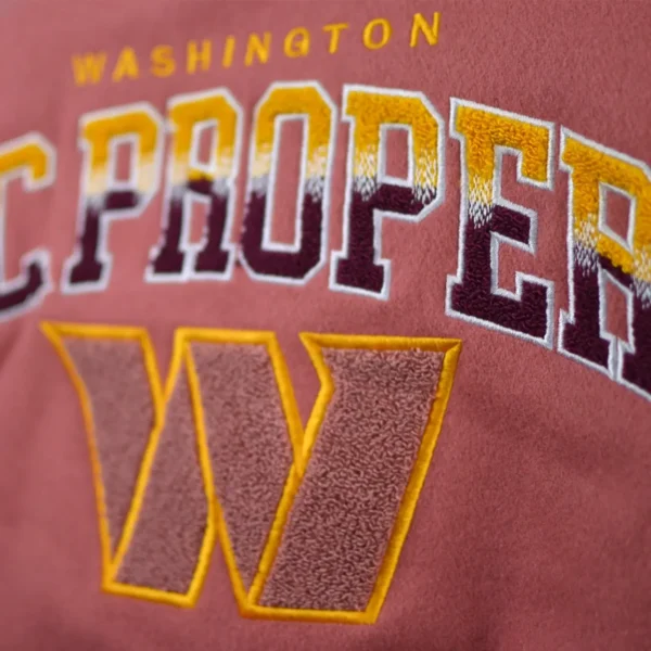 DC Proper Pink Washington Commanders Women’s Cropped Varsity Jacket